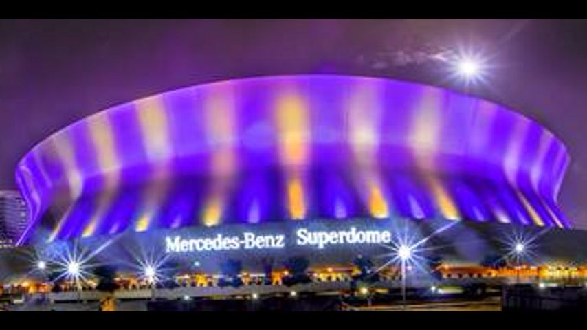 Superdome lit purple and gold in support of LSU Baseball