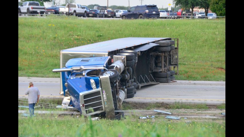 Cha-ching! Millions of dimes spill onto Texas highway after truck rolls