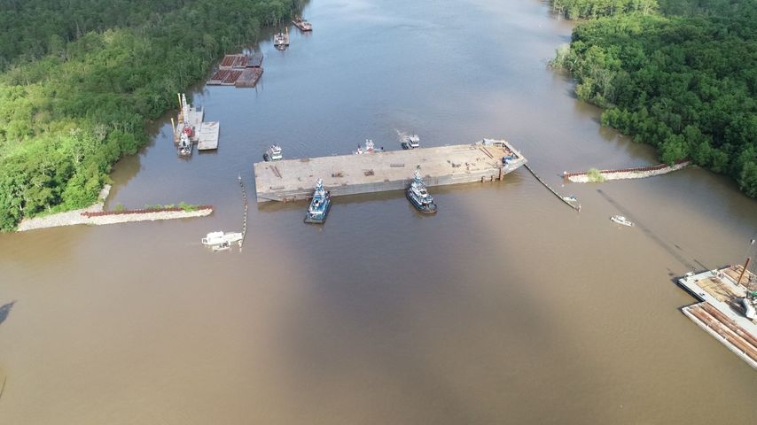 Crews Begin Sinking Barge Flood Gate In Bayou Chene Wednesday