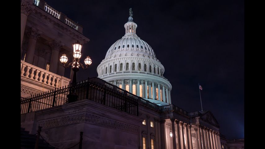 Biden signs bill that averts a government shutdown and brings a close to days of Washington upheaval