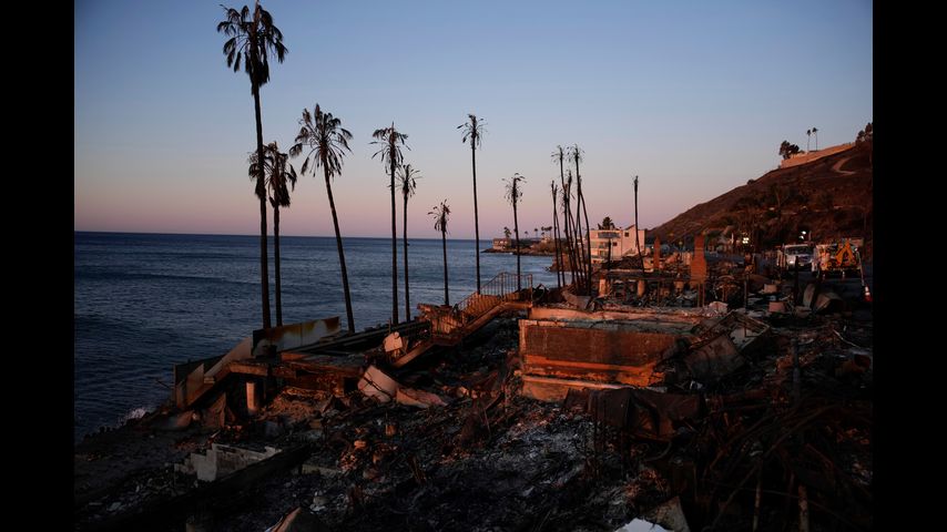 More firefighters rush to Los Angeles as stronger winds are forecast