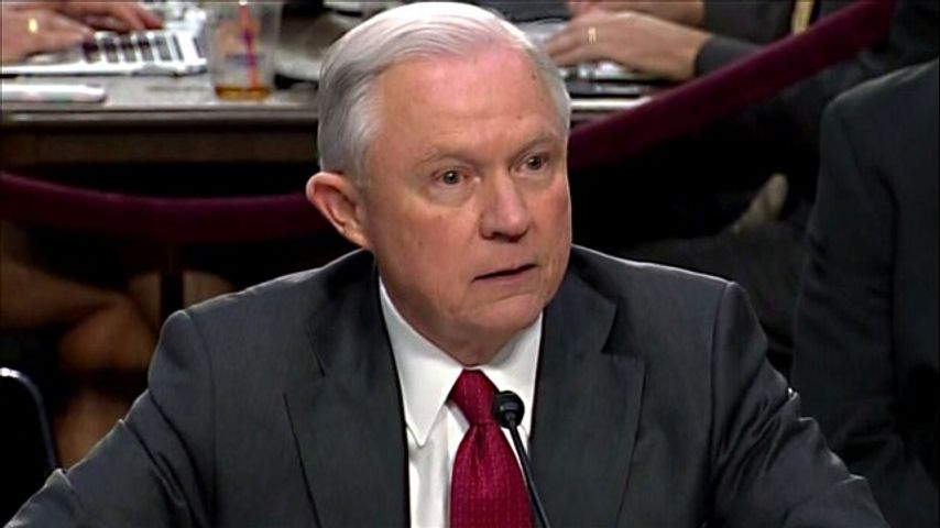Despite criticism, Sessions says he's staying on