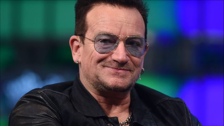 U2's Bono meets with Congressman Scalise's staff, signs card