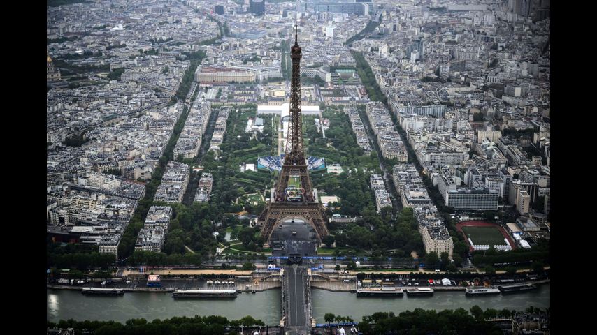 Paris Olympics begins with ambitious but rainy opening ceremony on the Seine River