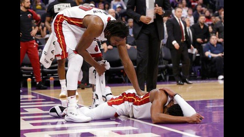 Kings come back from 11 down in fourth to beat Heat 102-96
