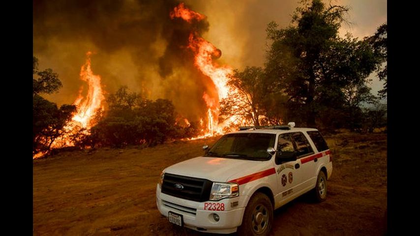 Wildfires burn across the US and Canada