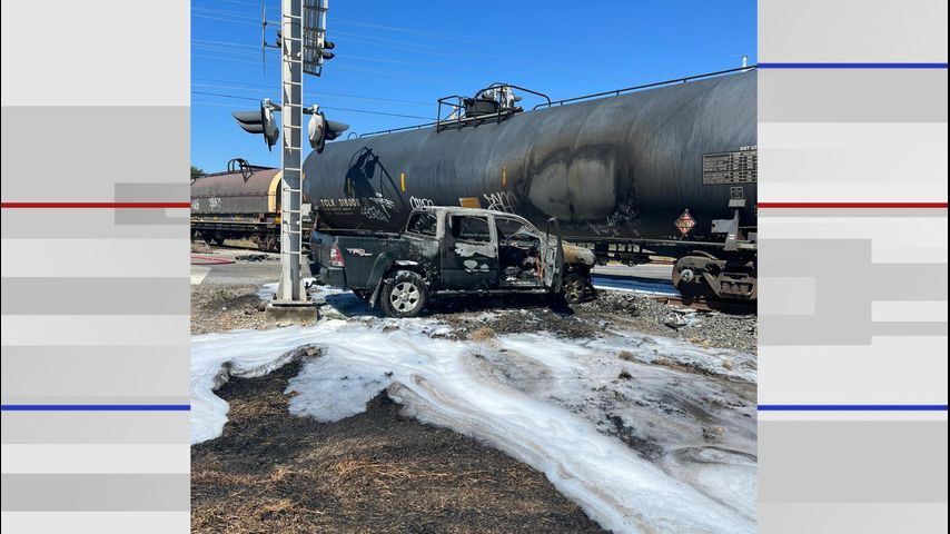 Truck catches on fire after colliding into train near San Benito