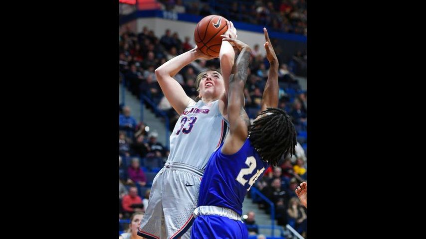 Samuelson leads No. 1 UConn to 99-61 rout of Seton Hall