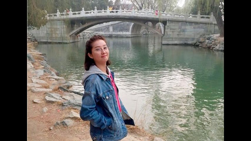 Family arrives as trial starts in slaying of Chinese scholar