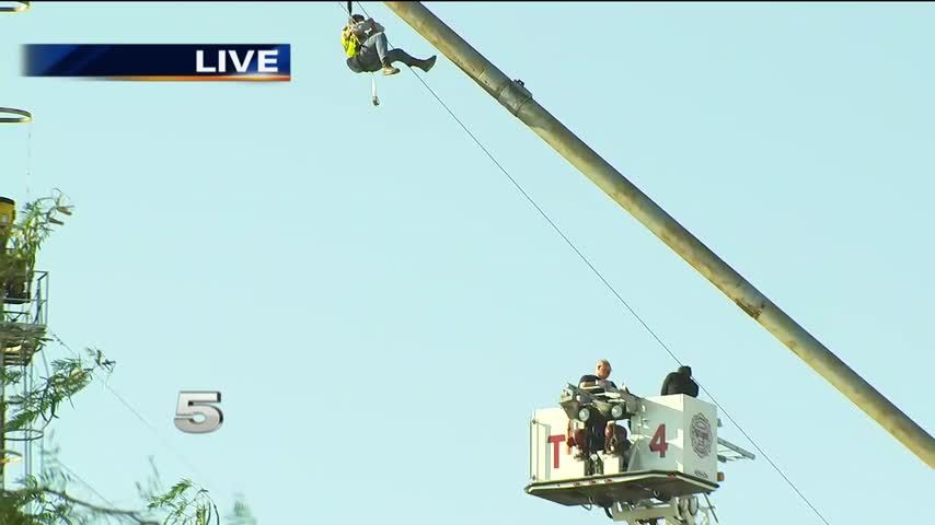 Garcia Grain Trading Employee Dangles from Wire 130 Feet in Air