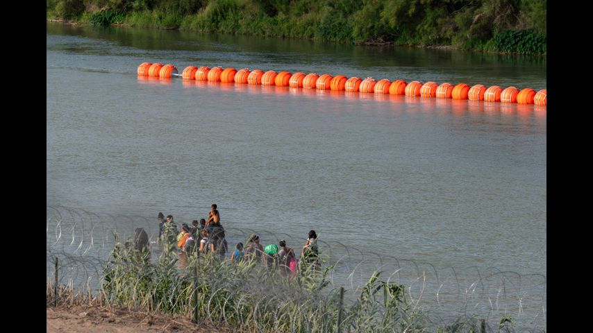 Texas troopers told to push back migrants into Rio Grande River and ordered not to give water amid soaring temperatures, report says