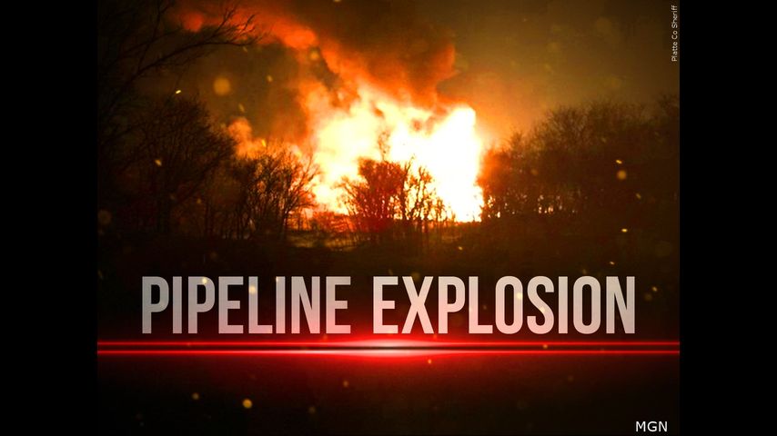 A pipeline explosion sends a towering pillar of flame over Houston's suburbs