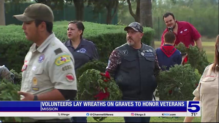 Volunteers lay wreaths on graves in Mission to honor veterans