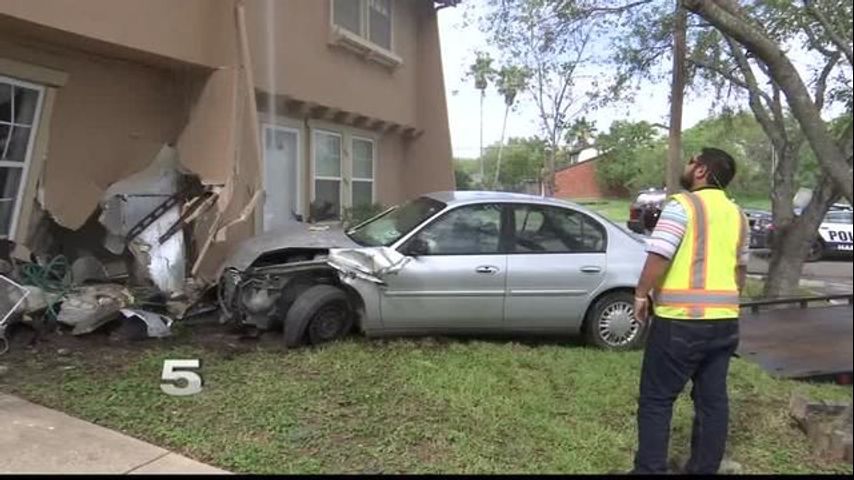 Woman Injured after Car Crashes into Apartment Complex