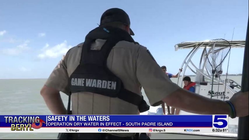 Channel 5 News ride along as Texas Game Wardens move shark out of shallow water