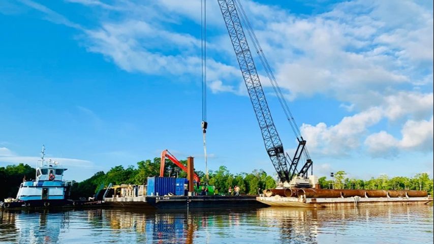Crews Begin Sinking Barge Flood Gate In Bayou Chene Wednesday