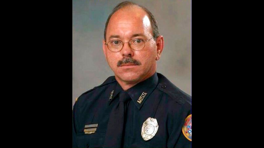 Mississippi police jail smiling suspect in officer's killing