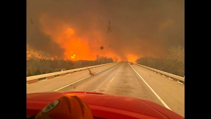 Wildfire grows into one of largest in Texas history as flames menace multiple small towns
