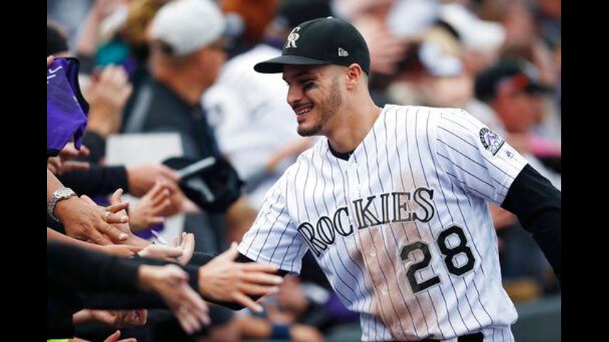 AP source: Rockies, Arenado agree to $260M, 8-year contract