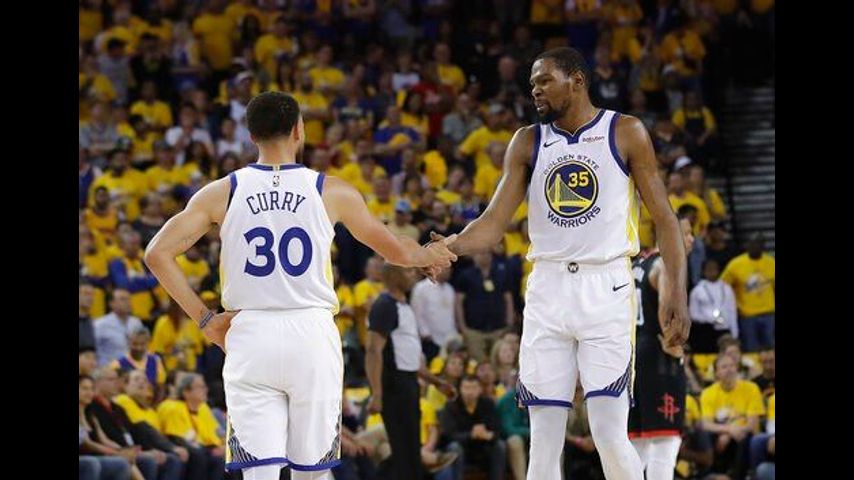 Durant's 35 points carry Warriors past Rockets in Game 1