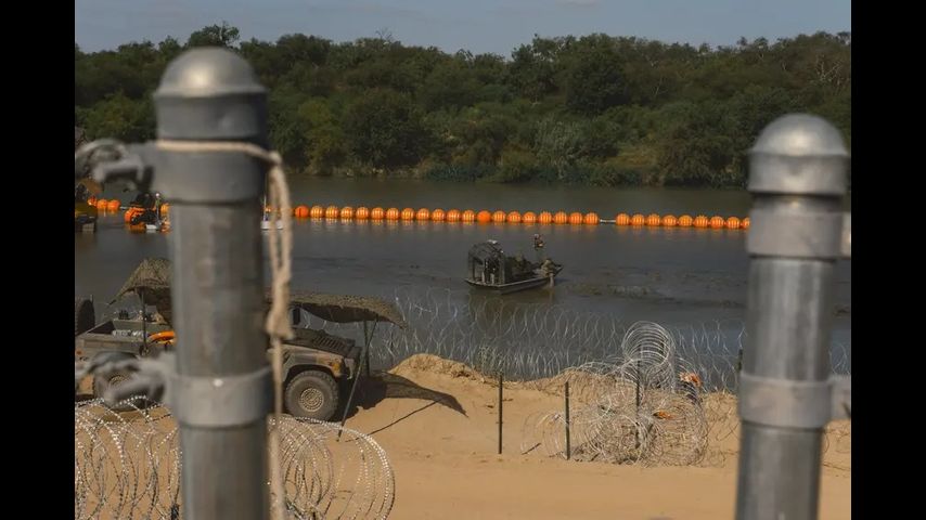 Texas’ floating barrier in the Rio Grande can stay for now, appeals court says