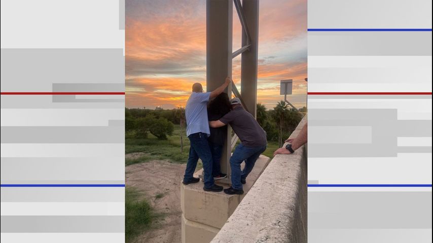 Border Patrol agents rescue woman who jumped onto highway overpass pillar in Brownsville