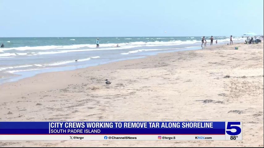 Emergency crews clean up tar that washed up on South Padre Island