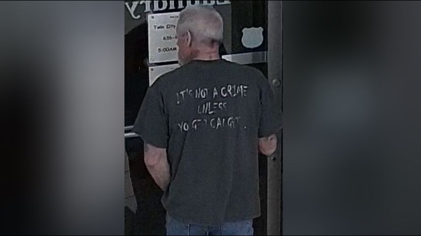 Man Wearing Its Not A Crime Unless You Get Caught Shirt Caught On Security Cam Committing Crime