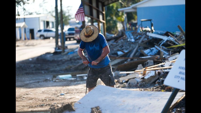 Supplies rushed to communities isolated by Helene as death toll passes 100