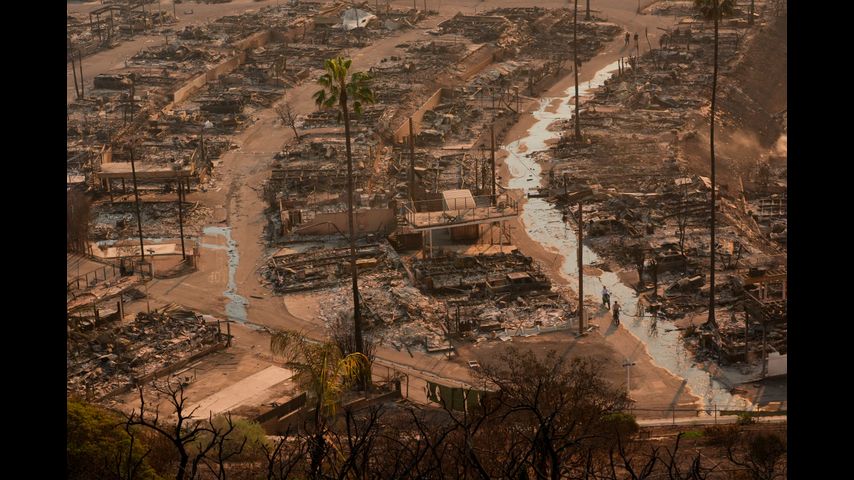 New LA-area fire prompts more evacuations as officials say thousands of homes, buildings have burned