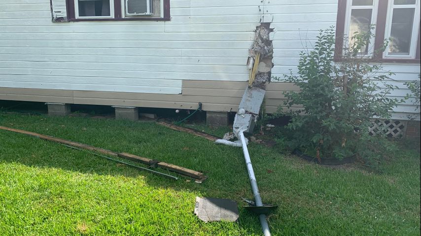 Truck trapped in power cable damages house, homeowner needs help