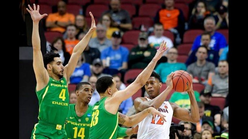 No. 1 seed Virginia outlasts No. 12 Oregon 53-49 in NCAAs