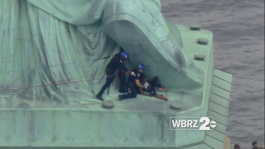 Woman arrested for climbing Statue of Liberty