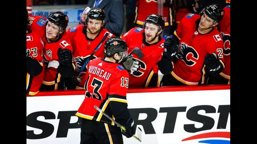 Gaudreau's big night pushes Flames past Devils 9-4