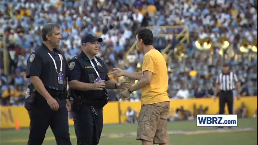 LSU takes its dugout circus — hats, masks and Tigers, oh my — to