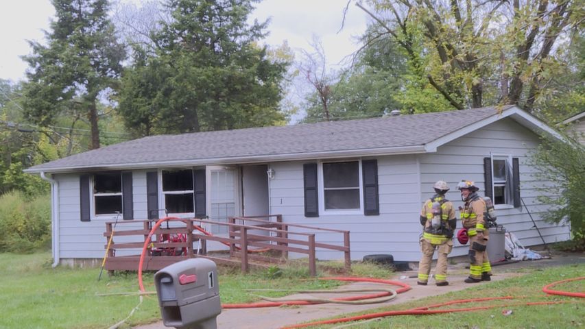 Firefighters battle fire at home in northeast Columbia