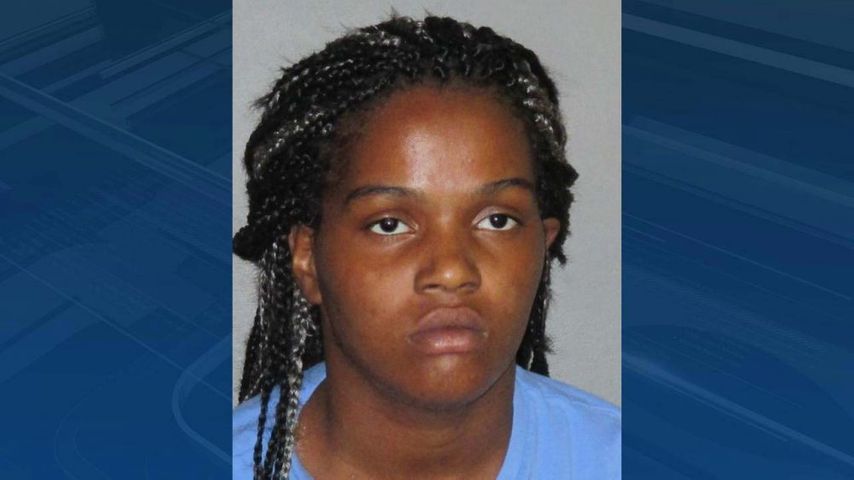 Woman accused of leaving infant in alley