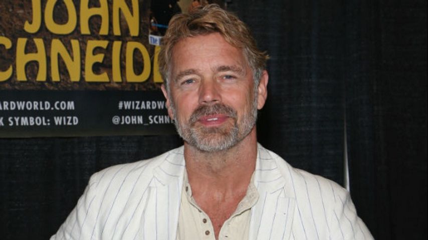 John Schneider and wife Elvira divorcing after 21 years of marriage