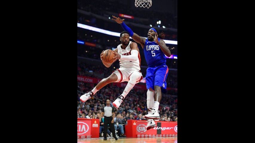 Wade scores 25 points in his 1,000th game, Heat top Clippers
