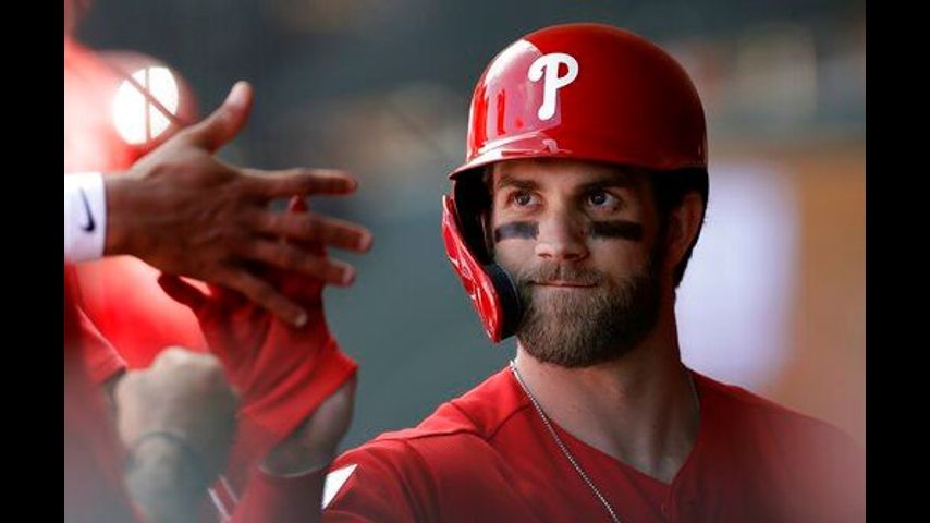 Harper returns after bruising ankle, still hitless in spring