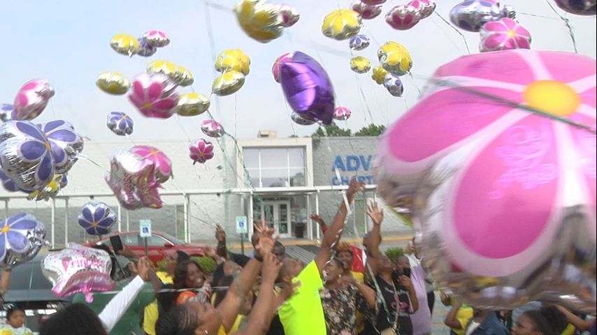 Balloon release held to honor 8-year-old girl killed in house fire