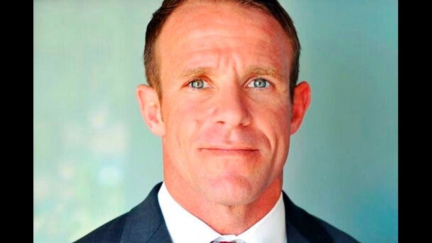 Navy SEAL seeks to toss slaying case over withheld evidence