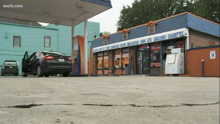 WATCH: Gas station clerk fights armed robbers off with chair