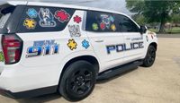 Town of Livingston wraps police units for Autism Awareness Month