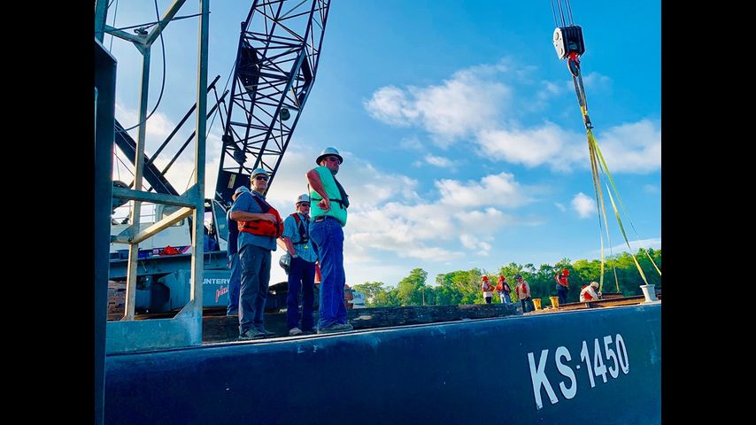 Crews Begin Sinking Barge Flood Gate In Bayou Chene Wednesday