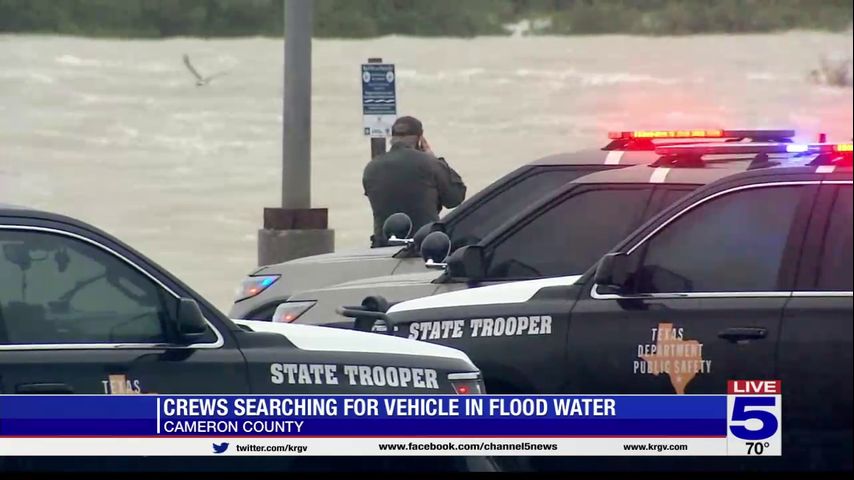 Search for vehicle in floodwater called off